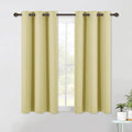 NICETOWN Blackout Curtain Panels for Bedroom, 2 Panels, W42 x L60 inches, Paler Yellow, Thermal Insulated Grommet Top Blackout Draperies and Drapes