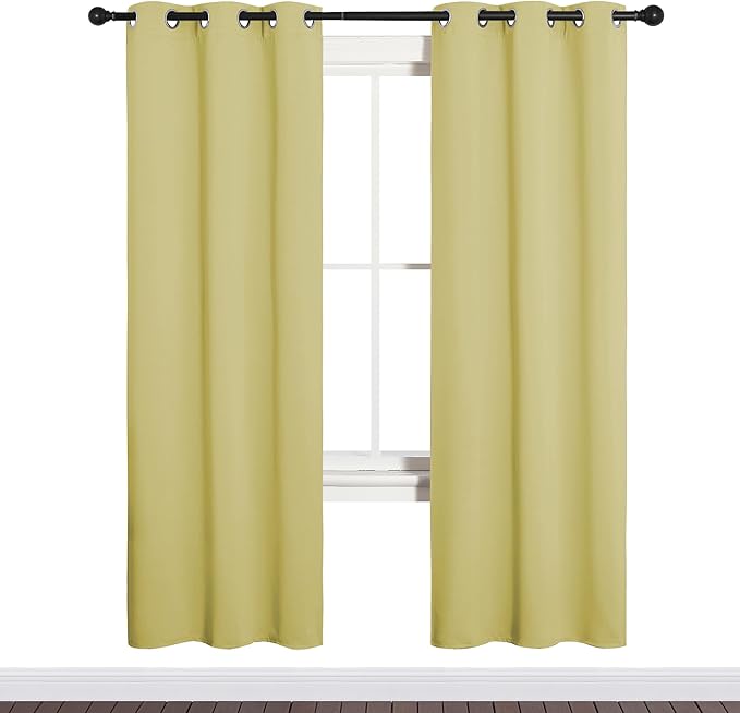 NICETOWN Bedroom Curtain Panels Blackout Draperies, Thermal Insulated Solid Grommet Blackout Curtains/Drapes (Paler Yellow, 1 Pair, 34 by 72-inch)
