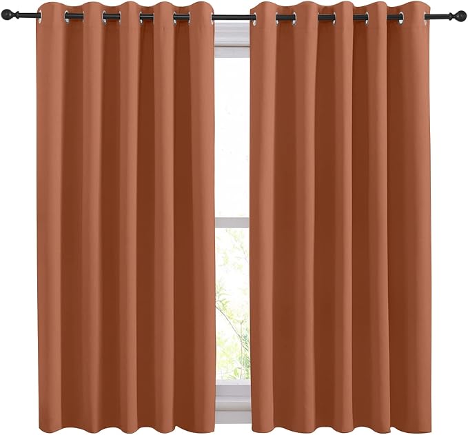NICETOWN Thermal Insulated Burnt Orange Curtains Blackout Draperies, Window Treatment Solid Grommet Room Darkening Drape Panels for Bedroom (Set of 2, 70 by 54 inches Long)