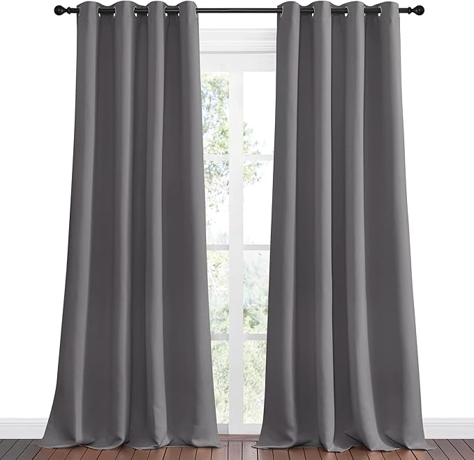 NICETOWN Bedroom Blackout Curtains Panels - Triple Weave Energy Saving Thermal Insulated Solid Grommet Blackout Draperies for Patio (1 Pair, 55 inches by 90 Inch, Grey)