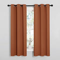 NICETOWN Blackout Curtain Panels for Girls Room, Nursery Essential Thermal Insulated Solid Grommet Top Blackout Drapes (Burnt Orange, 1 Pair, 34 x 63 Inch)