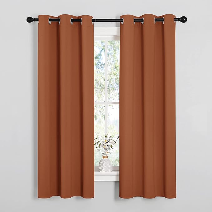 NICETOWN Blackout Curtain Panels for Girls Room, Nursery Essential Thermal Insulated Solid Grommet Top Blackout Drapes (Burnt Orange, 1 Pair, 34 x 63 Inch)