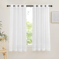 NICETOWN Sheer Curtain Panels Grommet - Ivory Voile Sheer Window Curtains for Bedroom/Living Room, 2 Pieces, 54 Wide x 63-inch Length
