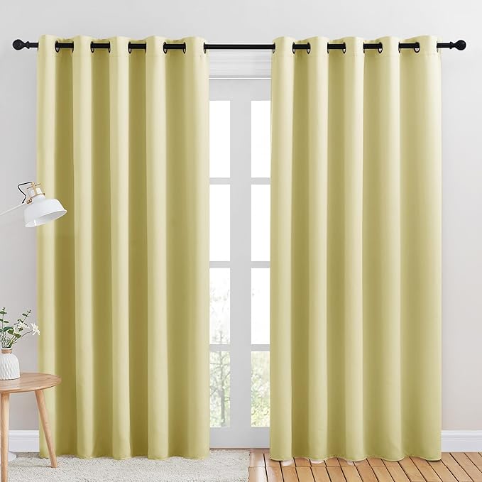 NICETOWN Blackout Draperies Curtains for Kids Room, Paler Yellow, Set of 2, 70 by 84 inches, Window Treatment Thermal Insulated Solid Grommet Blackout Drape Panels for Bedroom
