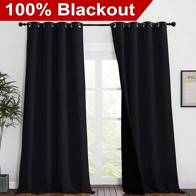 NICETOWN Cold Blocking 100% Blackout Curtains, Durable Black Lined Blackout Curtains for Bedroom, Energy Saving Long Curtains for Patio Sliding Glass Door, Black, 55 inches x 96 inches, 2 Panels