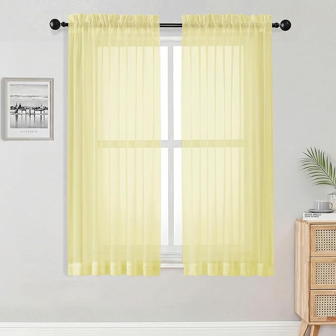 OWENIE Sheer Curtains 63 Inch Length 2 Panels Set for Bedroom Living Room, Modern Soft Solid Light Filtering Sheer Curtain, Rod Pocket Window Treatments, 42" Wx63 L, Light Yellow
