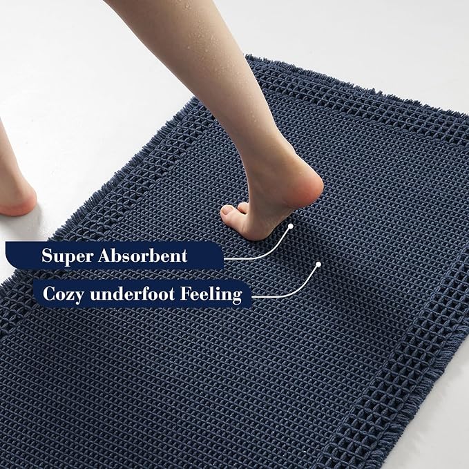 RESARE Waffle Bath Mat for Bathroom, Super Absorbent Bathroom Rugs Non Slip Machine Washable, Ultra Soft Quick Dry Boho Bath Rugs with Tassels for Floor, Upgraded Bordered Design, 18"x30" Navy