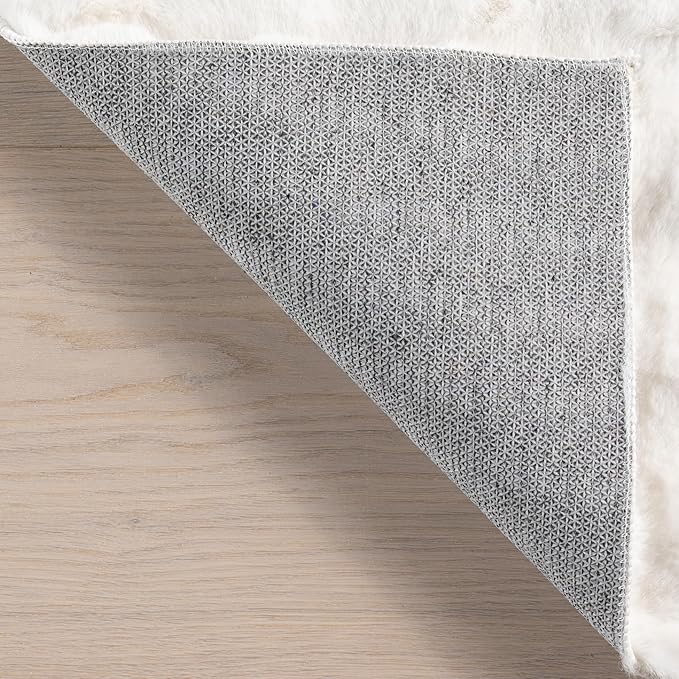Nuloom Jeni Off-White, 5' x 7'6" Oval, Solid Faux Rabbit, Fluffy and Cozy, High Traffic, Stain Resistant, Easy Clean, Durable Washable Area Rug for Bedroom, Living Room, Dining, Den, Foyer, Entryway